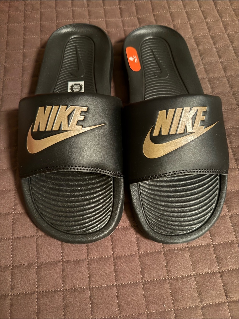 Women’s Nike Victori One Slides Black with Metallic Gold Logo
